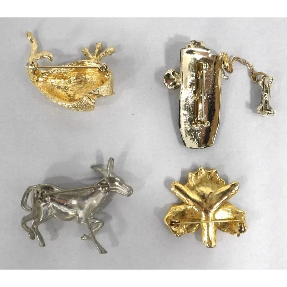 Set of 4 vintage pins brooches from the 1970's Whale, Telephone, Clover, Donkey